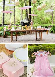 A classic baby carriage, pink paper flowers with golden leaves, an ornate mirror and even a crown. Cute Baby Shower Themes That Will Spark Your Imagination