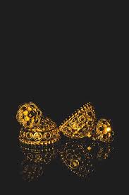 Background black blue abstract wallpapers images hd. Earring Gold Jewelry Traditional With Stones And Two Golden Earrings With Reflection Pair Of Golden Earring With Pearl Tone On Black Background Luxury Female Jewelry Close Up Jewelry By Srinivasan Jayaprakash