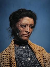 Imagine walking into a quiet parlor in the 1890s—drawn curtains, the air  heavy with the scent of flowers and sorrow. In the center of the room  stands a woman, her face etched