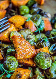 Roasted Sweet Potatoes And Brussels Sprouts The Food Charlatan Sprout Recipes Roasted Sweet Potatoes Roasted Vegetable Recipes