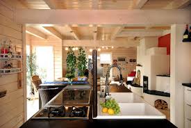 The homestyles americana kitchen island has a generous seating area, a cabinet, drawers and open storage shelves. Black Kitchen Island Interior Design Ideas Ofdesign