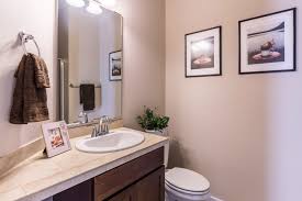 the bathroom and kitchen are two of the