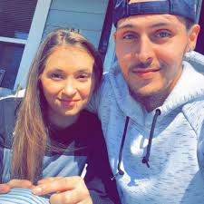 Who can remove tree limbs and service a metal roof in Lebanon, Ohio?