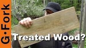 Pressure treated lumber products are treated in a pressurized cylinder. Pressure Treated Wood For Raised Garden Beds Gardenfork Youtube