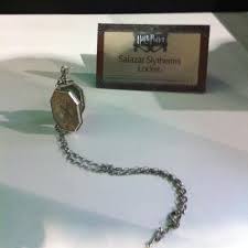 This stunning locket is instantly recognisable to any harry potter fan as an extremely significant dark magic artifact: Slytherin S Locket Harry Potter Wiki Fandom
