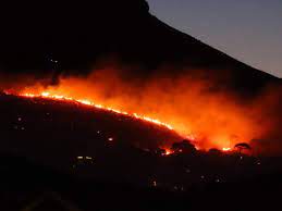 City skies are consumed with smoke as the blaze counties to ravage through the. Pictures Fire On Table Mountain Still Burning