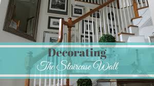 Instead, choose a potted plant or other decorative touch to place at the top and bottom of the stairs. Decorating The Staircase Wall Youtube