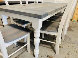 Farmhouse dining tables are great for a rustic home. 7ft Rustic Farmhouse Table With Turned Legs Chair Set Classic Gray Top And Antique White Base Wooden Dining Table