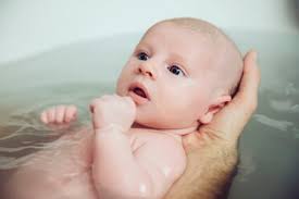 It's also the superior form of motor skill development for babies and infants. Father And Baby Taking A Bath Together Stockphoto