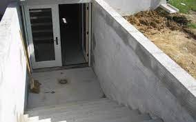 Basement Walkout Ideas Walkout Basement Prior To Seal Coating Concrete Walkout Basement Walkout Basement Basement Remodeling Basement Entrance