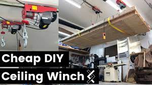 This electric motorized storage lift system holds up to 220 lbs. Cheap Diy Ceiling Winch Overhead Hoist Youtube