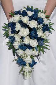 Check spelling or type a new query. Navy Blue And Ivory Rose And Lisianthus Cascading Bridal Bouquet Description From Silkbloo Navy Wedding Flowers Blue Wedding Flowers Wedding Flowers Navy Blue