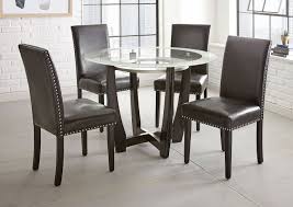 It was finished in very beautiful dark espresso color. Verano Brown Round Glass Top Dining Table Ivan Smith Furniture