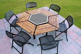 Wood makes it easy to build the main structure of your grilling station, then you can strong it with bricks or cinder blocks: 27 Surprisingly Easy Diy Bbq Fire Pits Anyone Can Make