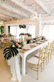Tropical Theme Wedding Reception Decor With Monstera Leaves Pineapple Centrepieces Tropical Wedding Theme Pineapple Wedding Decor Tropical Wedding Reception