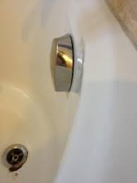 Your bathtub overflow cover may have a toggle switch in the middle. How To Remove Bathtub Overflow Plate No Screws Diy Home Improvement Forum