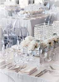 Marie decorated all the chairs with ribbon and greenery. Swoon Worthy Wedding Reception Setting Modwedding Wedding Decor Elegant White Table Decorations White Wedding Table Setting