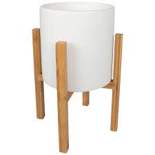 White planters™ has a long and proud tradition of achieving accurate planting with minimal downtime, wear or required maintenance. Matte White Planter With Wood Stand Hobby Lobby 1758663