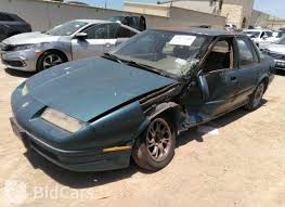 Image result for Black 1992 Saturn