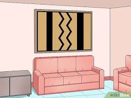Denke, dass eine holzkostruktion befestige die latten mit schrauben und dubeln an der wand. Einen Wandteppich Aufhangen Wikihow