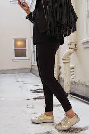 Black And Gold Casual Outfits For Ladies Gold Sneakers And Black Leather Fringe Dena Julia Sneakers Outfit Casual Black And Gold Outfit Black Friday Outfits