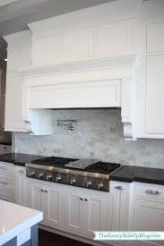 Backsplash For Black Countertops And White Cabinets My New Kitchen The Sunny Side Up Blog Kitchen Marble New Kitchen Carrera Marble Backsplash
