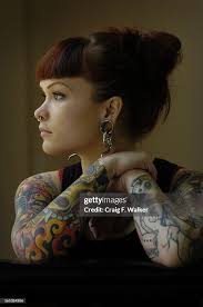 AUGUST 12, 2005_DENVER, CO_Receptionist Heidi Scheck poses for a... News  Photo