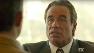 Why is John Travolta's face 'melting'