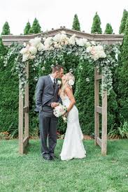 White Hydrangeas Eucalyptus Leaves Wooden Wedding Arch Http Www Deerpearlflowers Com White Hydrangeas Wedding Arbors Hydrangeas Wedding Wedding Trellis
