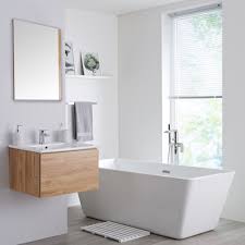 Even with the most useful storage solutions spread around the bathroom, bits and pieces will always work their way back to the surfaces surrounding the sink. Milano Oxley Golden Oak 600mm Wall Hung Vanity Unit With Basin Basin Vanity Unit Wall Hung Vanity Vanity Units