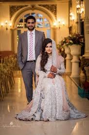 If we talk about the color of muslim brides dress, th. Photo Of Muslim Wedding Couple Portrait In Grey