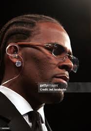 Performer R. Kelly performs his version of the national anthem before...  News Photo