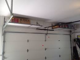 High Ceiling Garage Remodel Design With Wood Wall Mounted Overhead Garage Ceiling Storage Diy Garage Storage Overhead Garage Storage