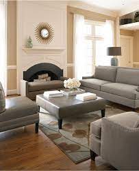 These living rooms will make you want to redecorate right now. Here You Go Khaki Walls With Grey Black And White Tan Walls Living Room Tan Living Room Living Room Furniture Layout