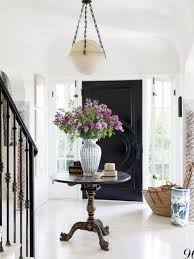 Foyer Entry Way Black Front Door Round Table Large Bouquet Of Flowers Or Peonies Ad Bouquet Blackdoor Foyer Decorating Home Decor Home Decor Inspiration
