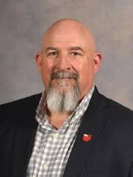 James P. Strange, PhD