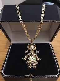 An octogenarian rag picker has created a tiny jungle in the heart of the city. 18ct Gold Filled Rag Doll Pendant With Curb Chain Ebay