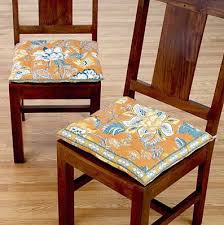 Then, remove the original fabric from the cushion by removing the staples (image 2). Colorful Dining Room Chair Cushions In Seven Colors Colorful Designs Pictures And Colorful Dining Room Chairs Dining Room Chair Cushions Dining Room Chairs
