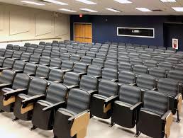 Lancaster Auditorium Seating Named After The Lancastrian System Of Classroom Design Increases Learning And Retention Auditorium Seating Furniture Auditorium