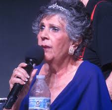 Villager returns to stage in wheelchair after taking terrible fall last  year