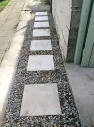 Make sure the stone is level. How To Lay Stepping Stones On Gravel Guide On Laying Paving On Chippings