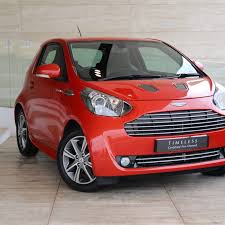 Image result for Magma Red 2011 Aston Martin