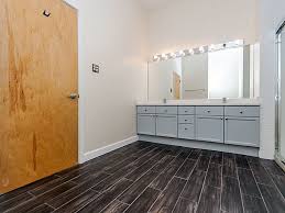 Yes Please High Impact Wood Like Tile For The Bathroom Floor Boardwalk Charcoal Faux Wood Floor Tile 5 8 X 2 Faux Wood Flooring Wood Like Tile Tile Floor