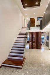 Foyer And Timber Stairs Polished Concrete Floor Stairs Concrete Floors New Homes
