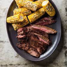 Pour into a resealable plastic bag and add the steak pieces. Grilled Cumin Rubbed Flank Steak With Mexican Street Corn Cook S Country