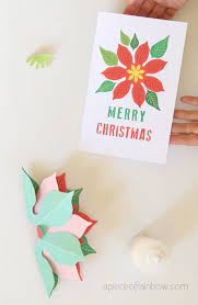 This craft project creates a santa claus figure that seems to pop out of a chimney when you open the card. Festive Diy Pop Up Christmas Card Free Template A Piece Of Rainbow