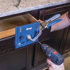 Measure between the holes on the back of the cabinet door handles to find the correct center to center spacing for the holes. Cabinet Hardware Jig Official Store Kreg Tool