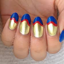 Red, Gold, and Blue Funky French nail art by Kasey Campa ...