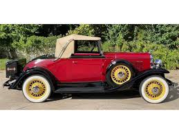 Image result for Martini Brown 1931 Oldsmobile