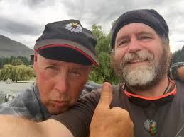 Local New Zealand farmer with Chris Linton gives the thumbs up in support  of the Beyond Moods Charitable Trust and support for greater awareness  toward farmer mental well-being.